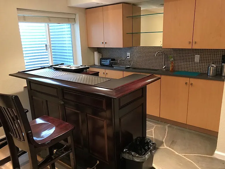 basement level 2nd kitchen with full sized fridge