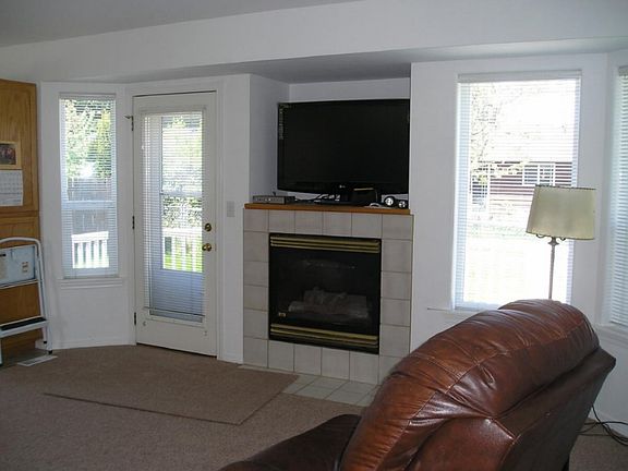 Family room has gas fireplace & adjoins the kichen, access to deck & yard