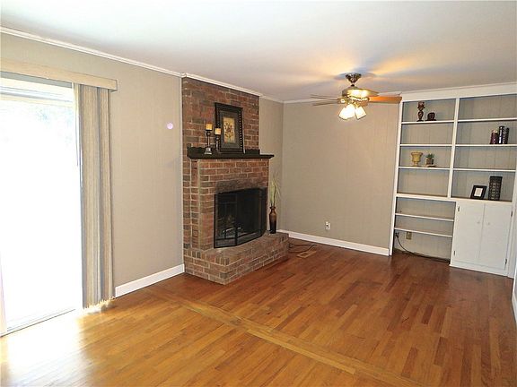 View of dining area/living area with access to the back yard.