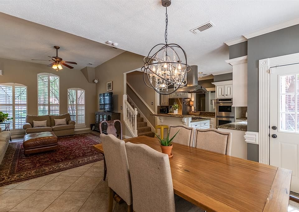 This is the family area you have been looking for The open kitchen, family room and breakfast room! With easy access to the backyard oasis with a pool and tile floors to accommodate wet feet.