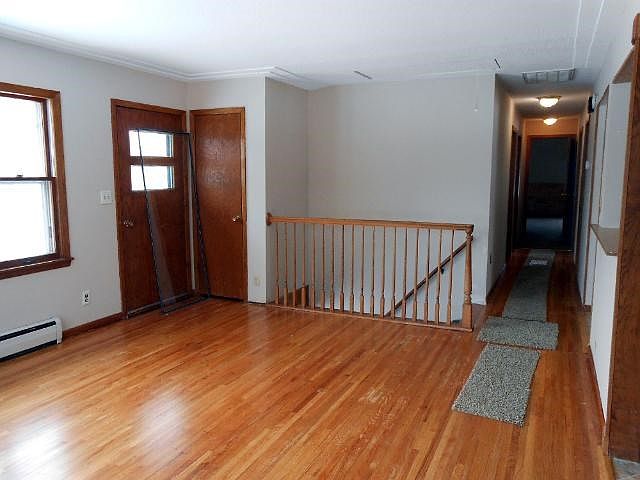 Hardwood floors throughout main level.  Custom finishes with tile and natural wood.