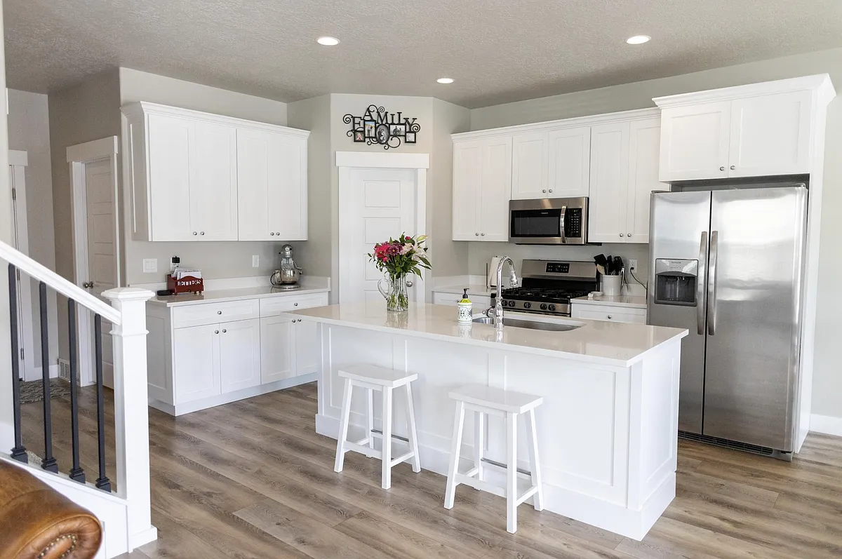 Photo 1 of 21 - 2644 N Cormac Pl - Lehi, UT Bright Kitchen, beautiful quartz countertops with large walk-in pantry. - 2644 N Cormac Pl