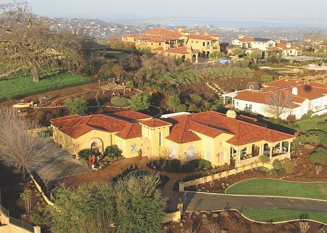 Aerial view of the home and Folsom Lake in background