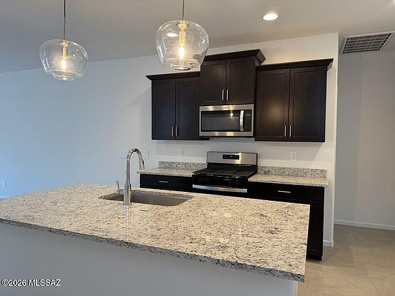5th image of 9786 N Solstice Ave