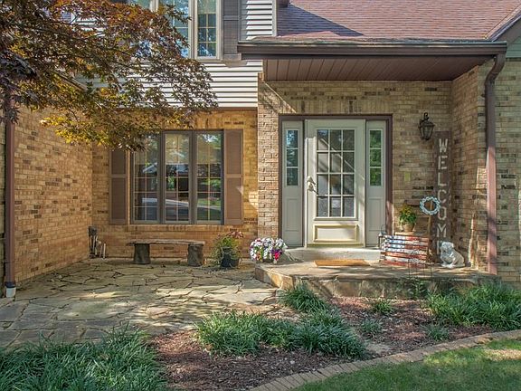 This 1.5 story room has a unique stone leading up to your new home!