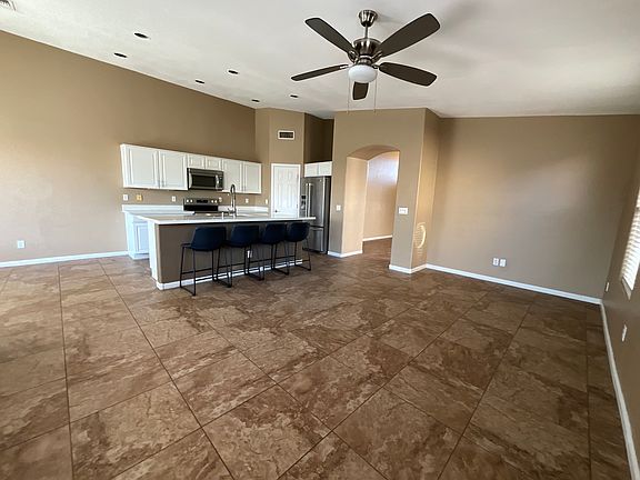Huge chefs kitchen with island, breakfast nook and dining area