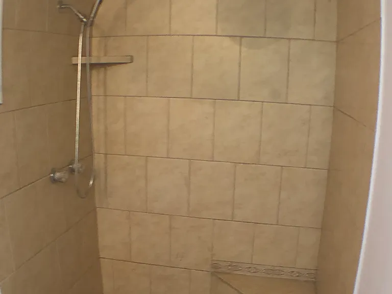 Bathroom in separate studio.