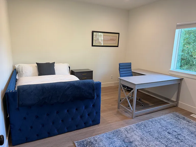 Main level bedroom that doubles as an office