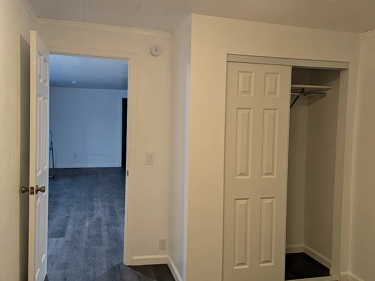 First bedroom goes out to living area.