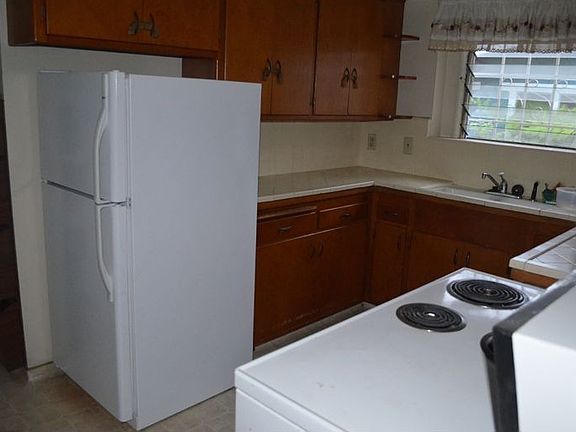 kitchen before gas stove microwave and dishwasher