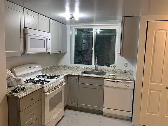 Open Kitchen newly renovated with a lot of natural light coming through a big window