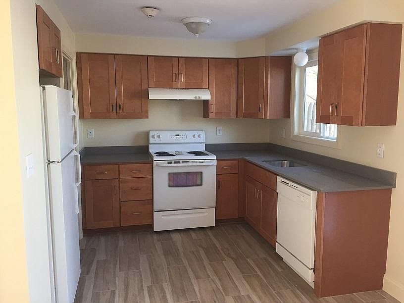Brand new cabinets, appliances, counetertops and flooring