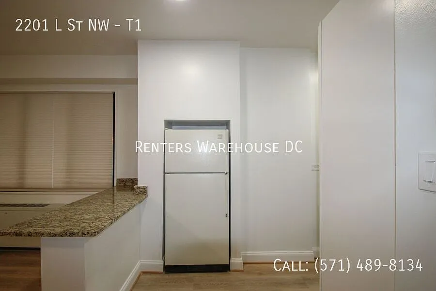 Don't Miss This Large 1bd/1bth Condo W/ Assigned Garage Parking Next To The Ritz! — Photo 4