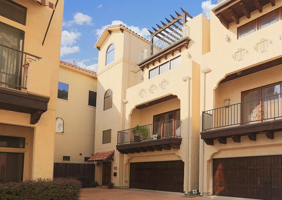 4 Stories with north and south exposure, 3 terraces, and extra parking for guests right outside your front door!