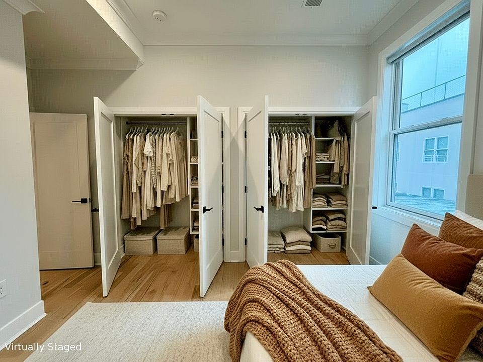 Primary suite - 2 california fitted closets.