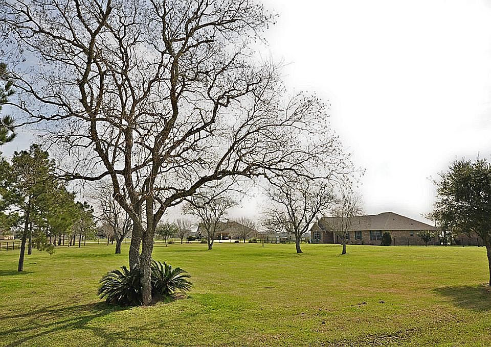 This 3 Bedroom 2 bath plus a study sits on 10 acres with a 12 stall barn