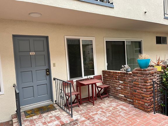 Front entrance and patio looking into courtyard