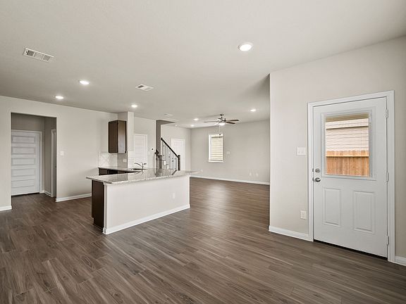 Dining Room to Kitchen and Family Room