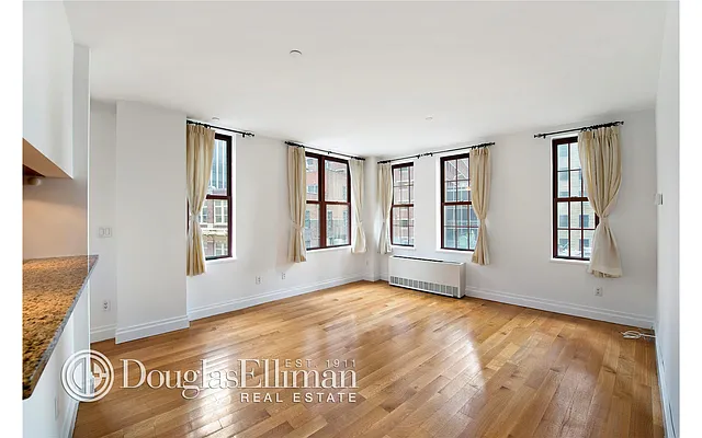 Sold by Douglas Elliman | media 12