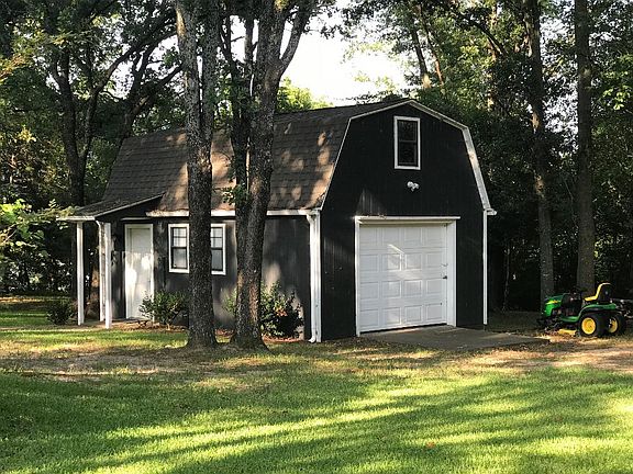 Two story shed w/ stone walk