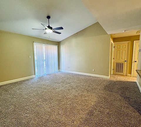 Living room with a glass sliding door to your own private balcony.