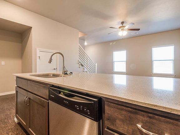 Stainless steel dishwasher, double-basin sink, lots of stora