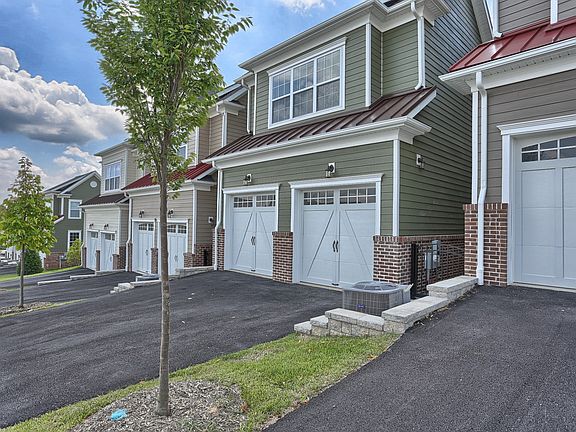 Attached 2-car Garage with Rear Access assures beautiful streetscapes