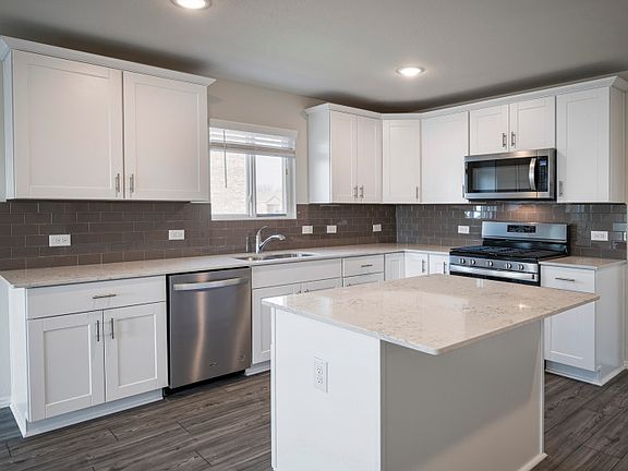 Abundant cabinet space in kitchen.