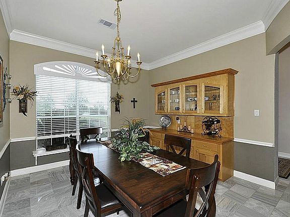 Alternate view of the dining room .  2" blinds throughout the house!