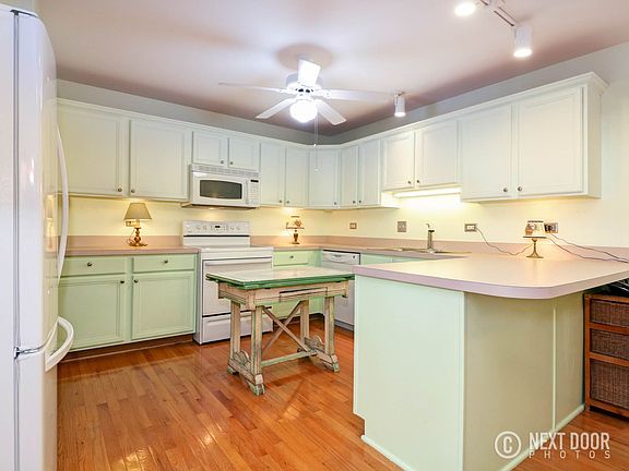 kitchen with a bar for eating