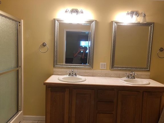 Double shower heads and large jacuzzi tub in master 