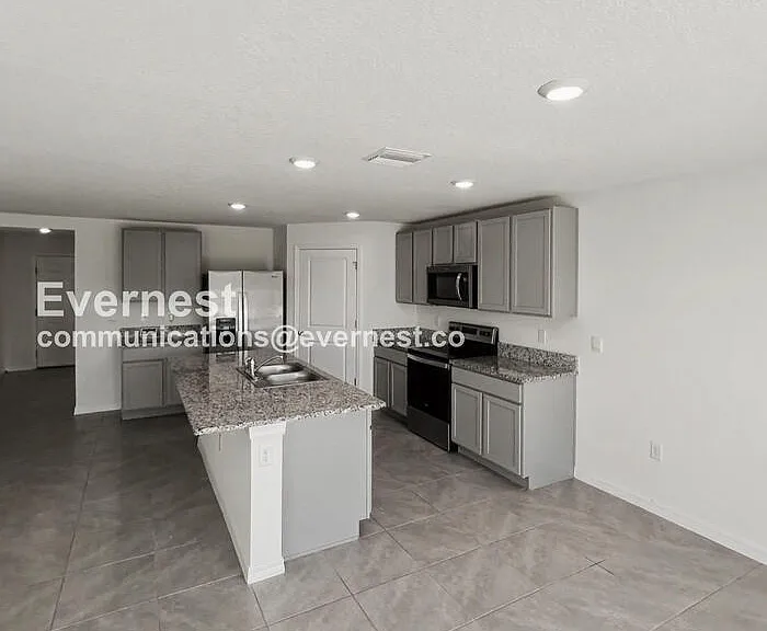 5106 Plumeria Dr — Photo 3