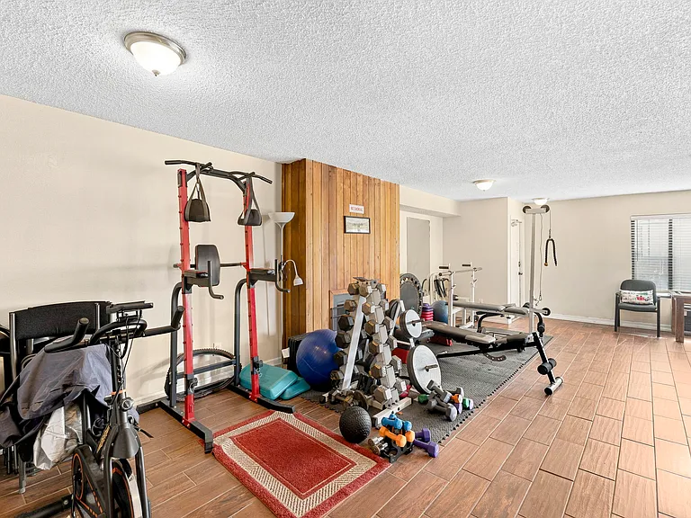 Community gym in building's Rec Room