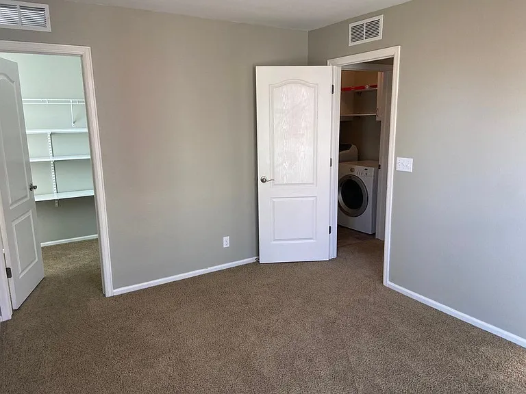 Third bedroom, view to walk-in closet