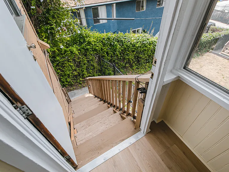 stairs from laundry room to common area yard