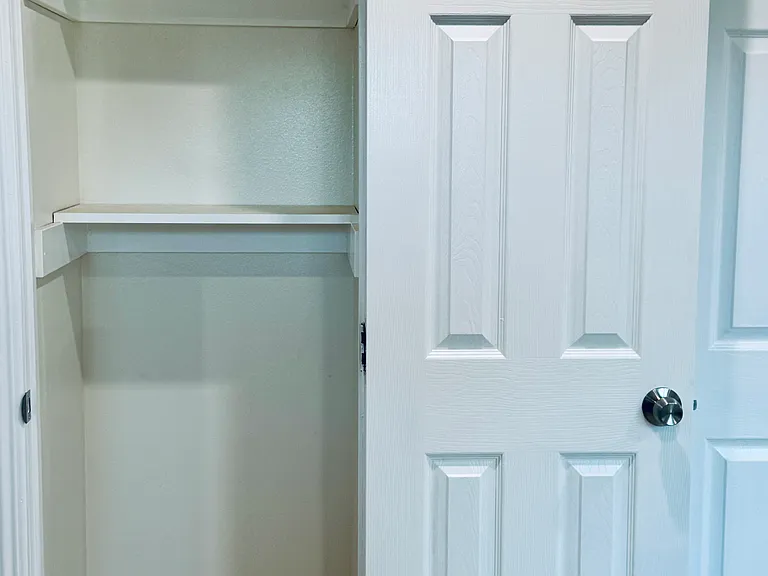 Spacious multi-use storage/pantry.