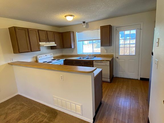 Kitchen with access to backyard patio