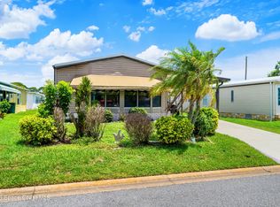 602 Dolphin Cir, Barefoot Bay, FL 32976