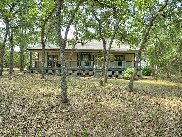 Front Exterior with Covered Porch/Deck