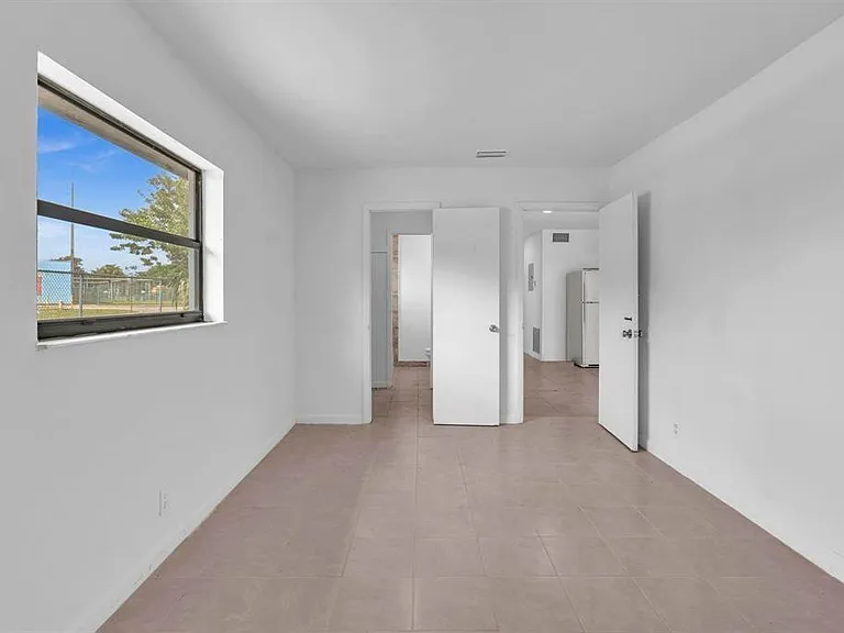 5748 NW 27th Ct — Photo 13
