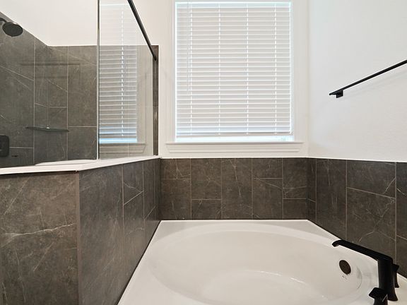 Owner s Bath with Walk-In Shower and Tub