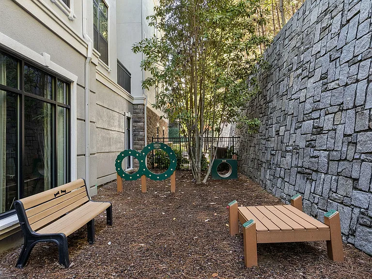 Relax and unwind in our inviting outdoor nook, perfect for leisure and play.