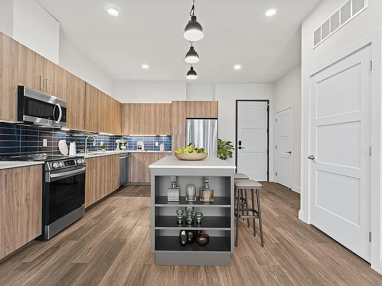 Modern kitchen with wooden flooring