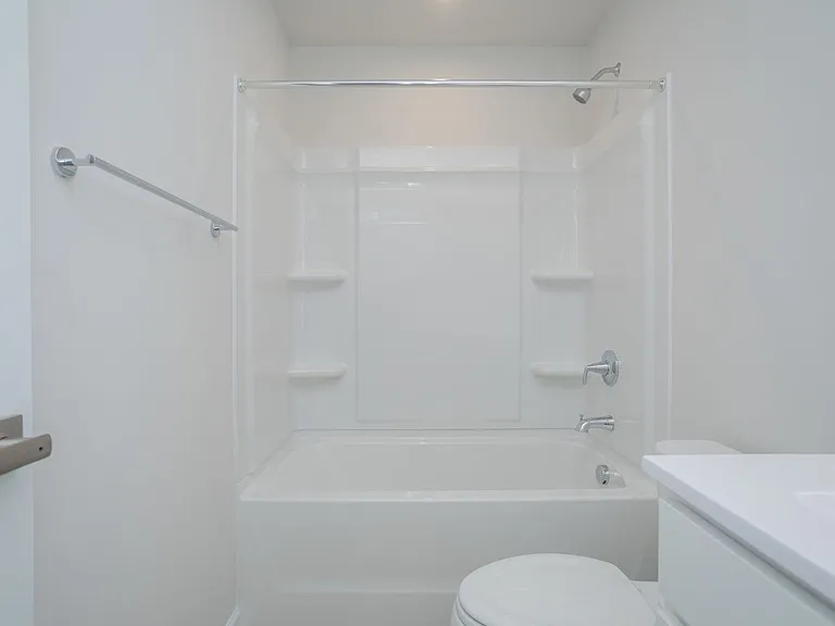 Bedrooms 2&3 share a full-sized hall bathroom, with linen storage