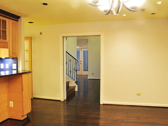 Dining room view towards living room and door to north patio