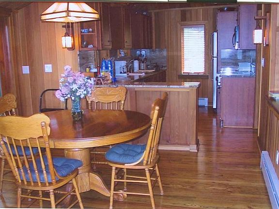 lovely kitchen with seperate eating area and wood floors