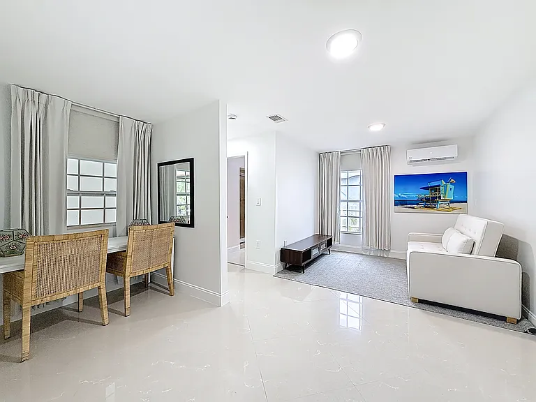Den with Double Sofabed, ( Note: TV being installed & single sleeper matching sofa as well). Desk space with window overlooking Miami River & Pergola area