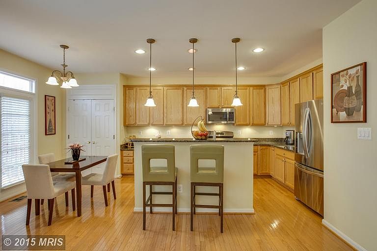 Kitchen w/ custom light fixtures