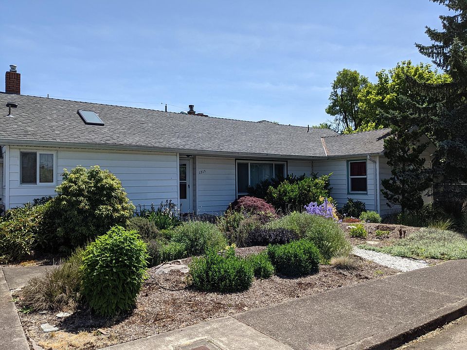 Front of house - attached garage to left