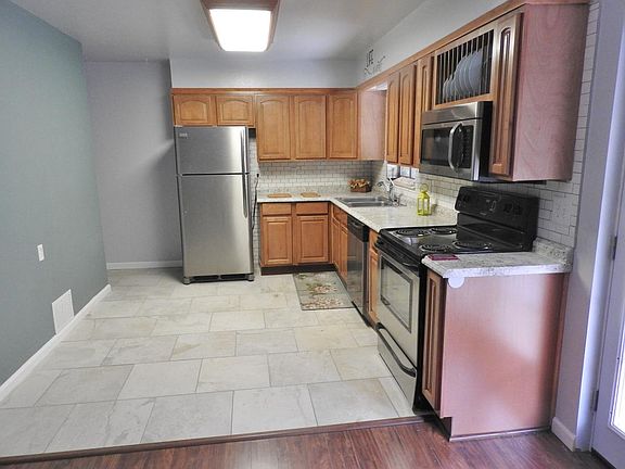 updated kitchen with new tile floor
